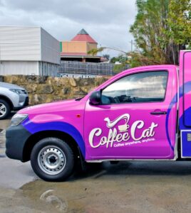 Ute Signage Ute Signage – Coffee Cat Branded Vehicle Wrap Example 1 Coffee Cat ute with bright pink vinyl signage for mobile brand advertising