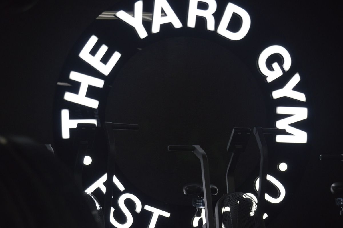 The Yard Gym front lit logo lettering illuminated sign in interior of Perth gym