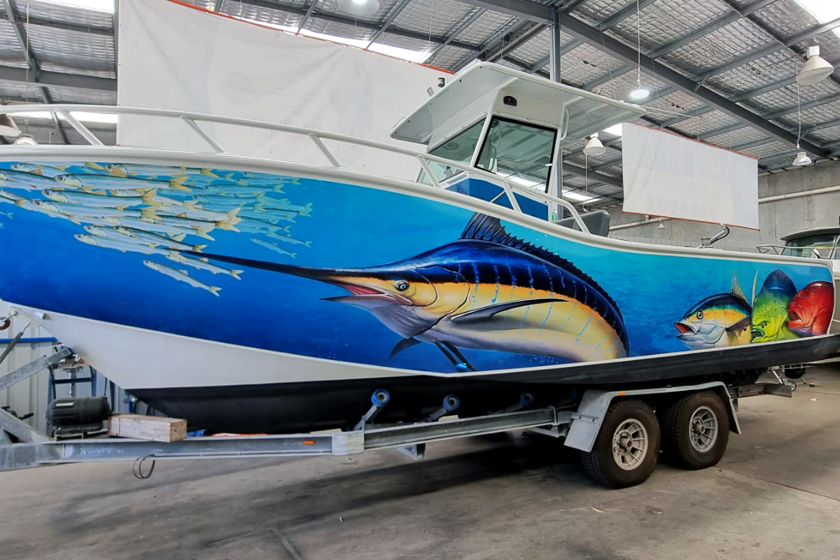 Perth Hull Wrap Marine & Boat Signage 63 Image of trailable boat in Perth workshop displaying vibrant hull wrap boat graphics