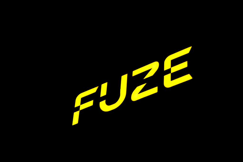 illuminated building sign perth lit up at night FUZE - Relocation Signage Strategy 9 illuminated building sign illuminated at night displaying FUZE logo
