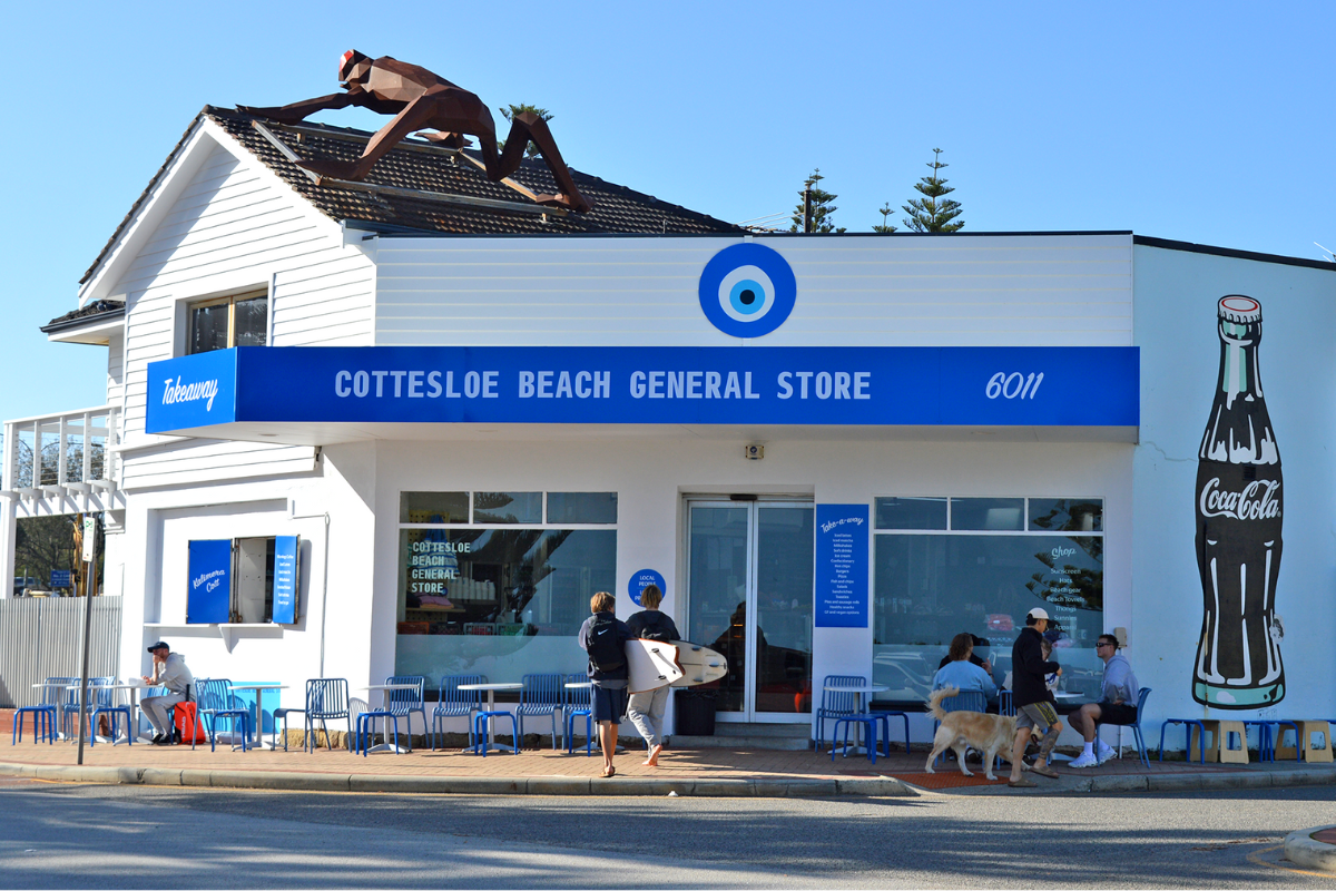 Cottesloe Beach General Store Shopfront Signage Perth Go Graphics Commercial Signage 2 Cottesloe General Store storefront displaying vibrant shopfront building signage and customers out the front of the store