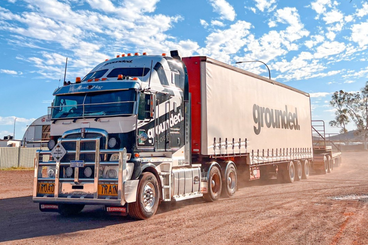 Grounded Mine spec Signage Perth Truck Vehicle Graphics 75 Grounded truck driving on wa mine site with branding on side of truck