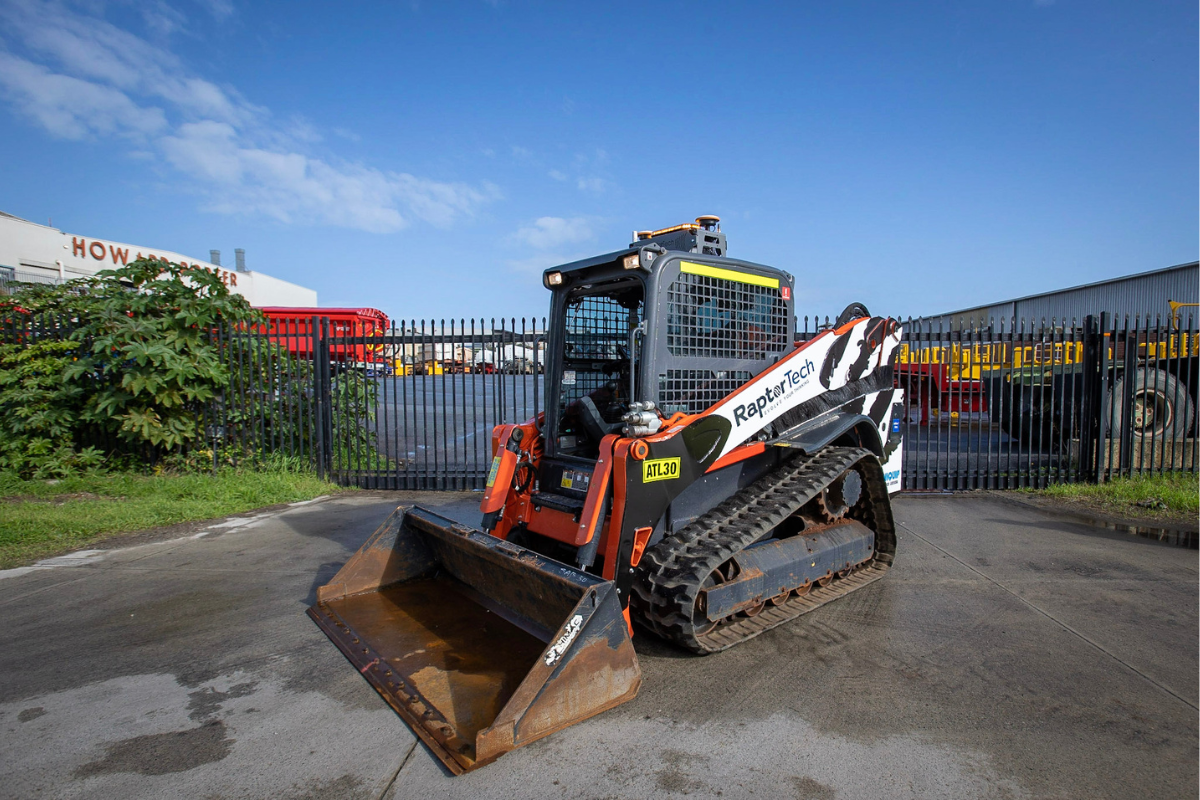 Mine spec Signage Perth Digger Mine Spec Signage Perth 17 RaptorTech digger parked outside headquarters displaying mine spec compliant signage