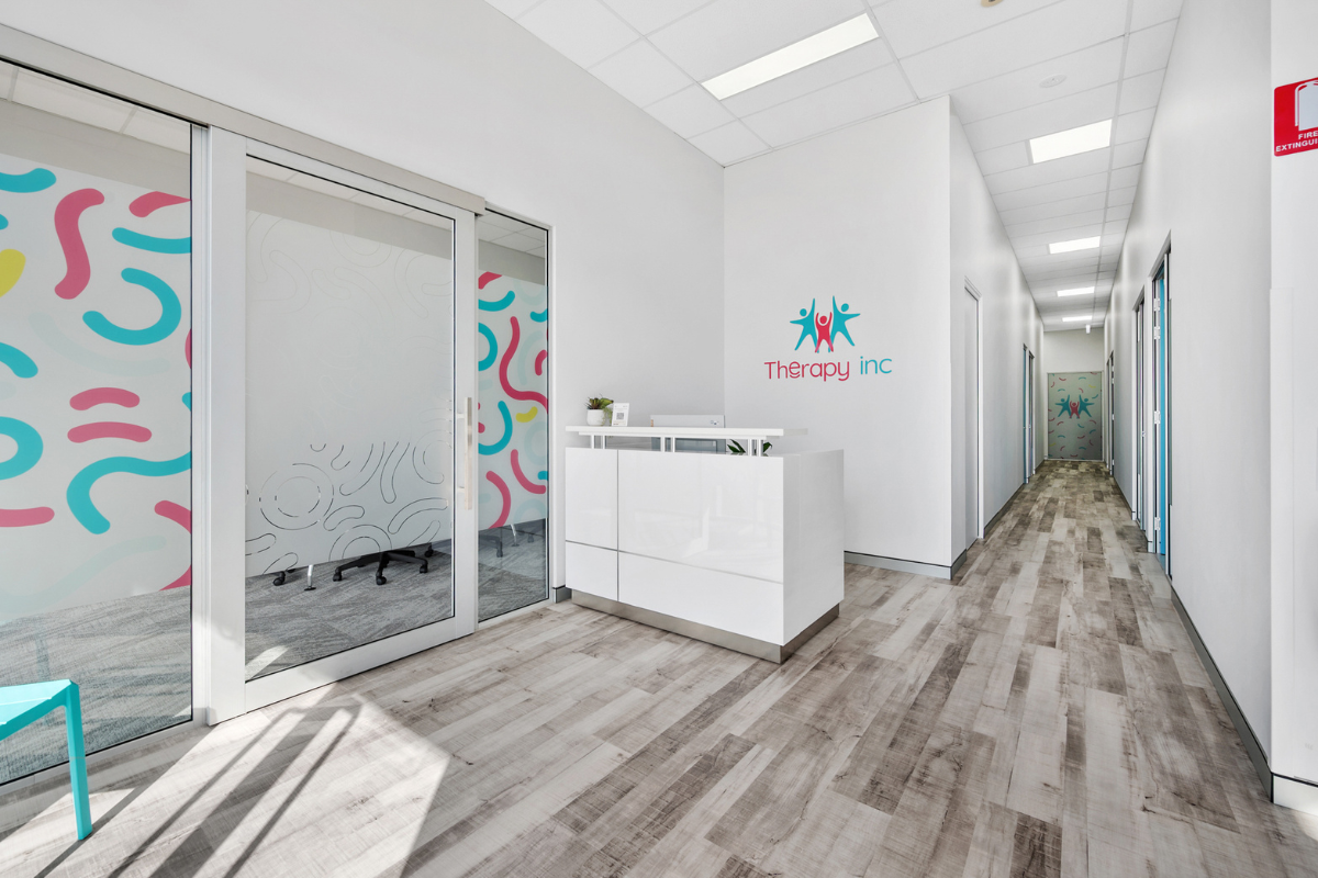 Therapy Reception Signage Perth Go Graphics Reception Signage 8 interior image of Therapy Inc entrance showing reception sign and entrance window decals